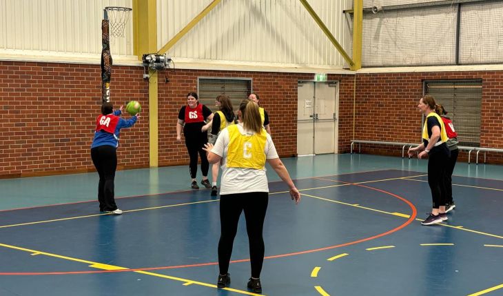 Netball anyone? Image of netball players setting  up for a goal shot